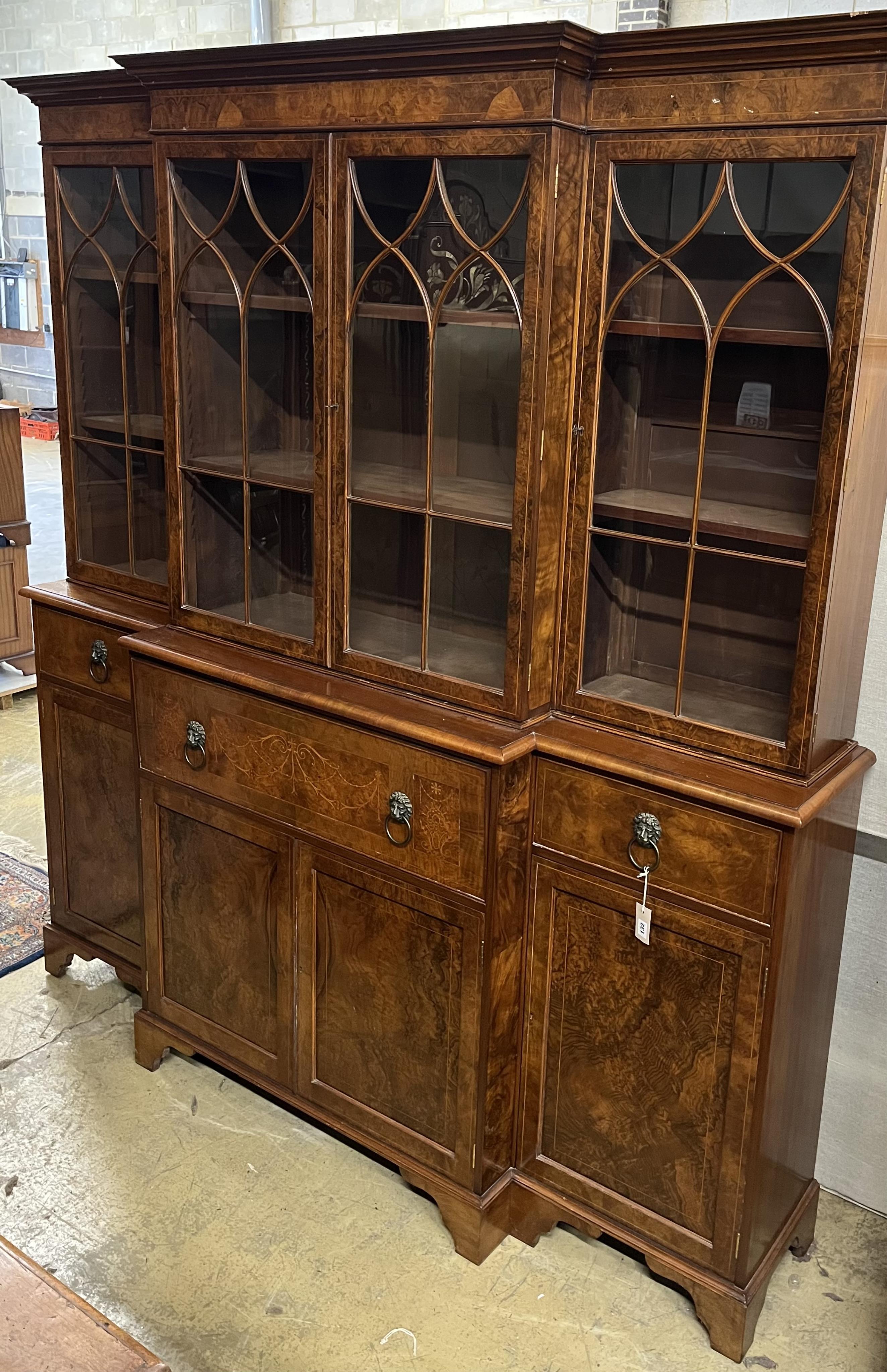A George III design inlaid burr walnut breakfront library bookcase, width 208cm, depth 36cm, height 124cm. Condition - good